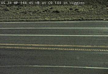 US 34 MP 144.45 WB at CO 144 in Wiggins: Looking at Road Surface